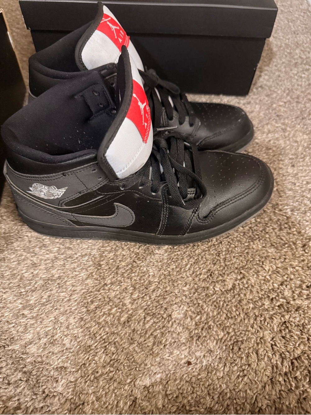 Jordan Black High-Top Sneakers with Red Tongue Accents